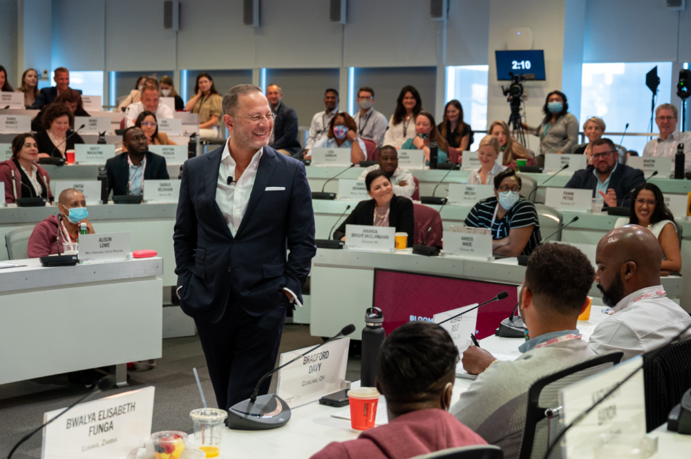 A professor speaks to a class of city leaders.