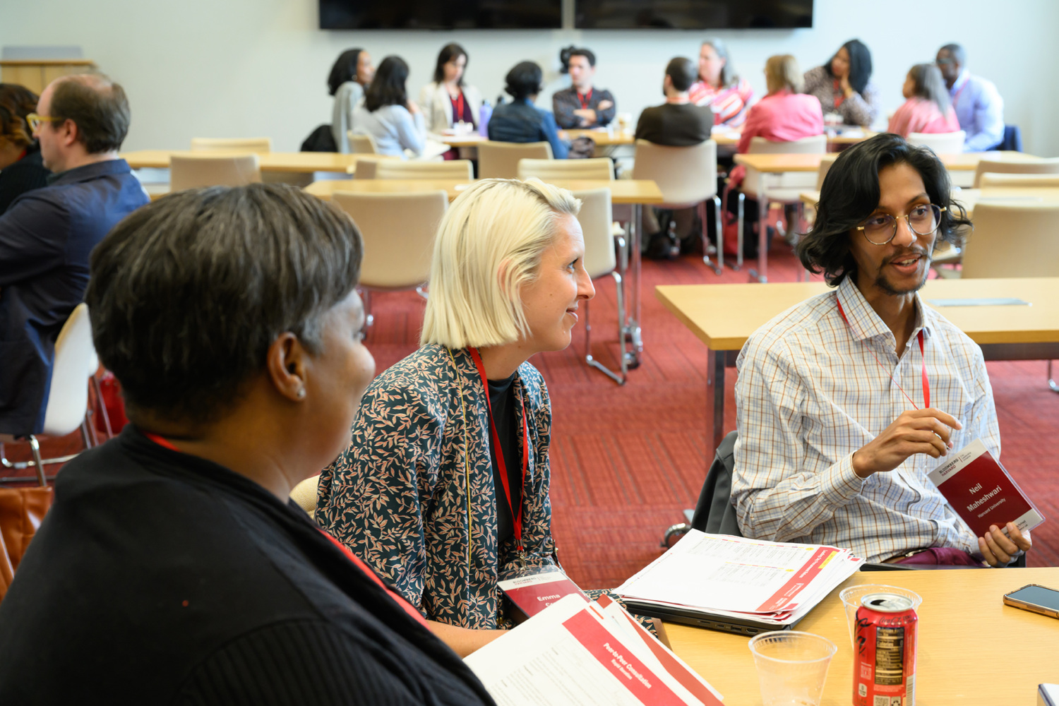 students sitting around a table talking